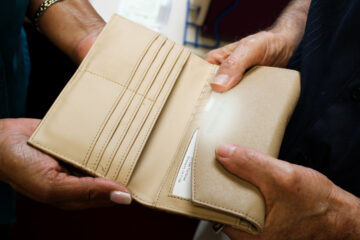 man and woman holding wallet ccnla shreveport